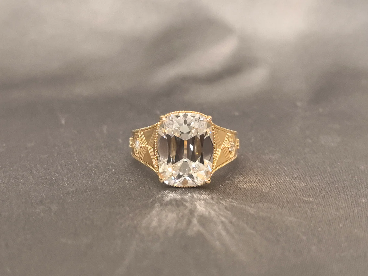 ba0847dca51fcaa1051c61fe87ffaab6 Cushion Lab Grown Diamond Ring | Ornate Thick Band | 14K Gold | Four Accent Diamonds - Image 1