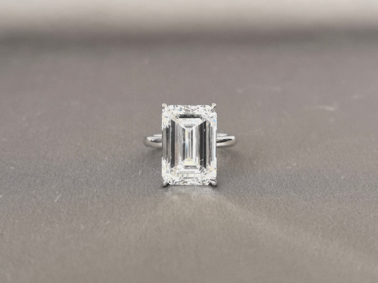 bd8af8a85246f5ade30f95f91c391199 Emerald Cut Lab Grown Diamond Ring | Solitaire Setting | 4-Prong | 14K Gold | Timeless Simplicity - Image 1