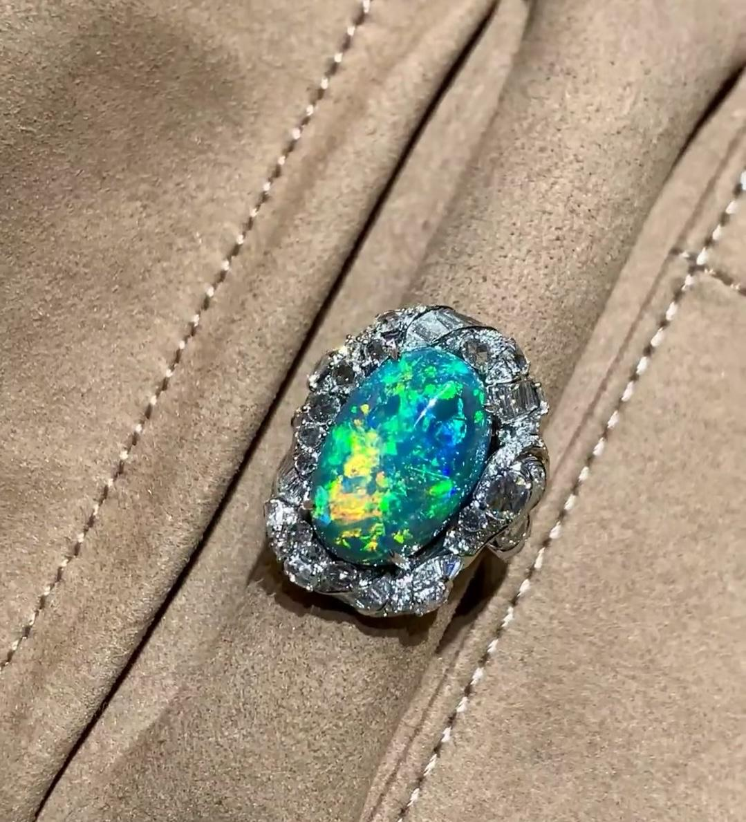 26e3956668756dc199b92d7afa6d64bf 5.83ct Natural Black Opal 18K Gold Diamond Ring - Image 1