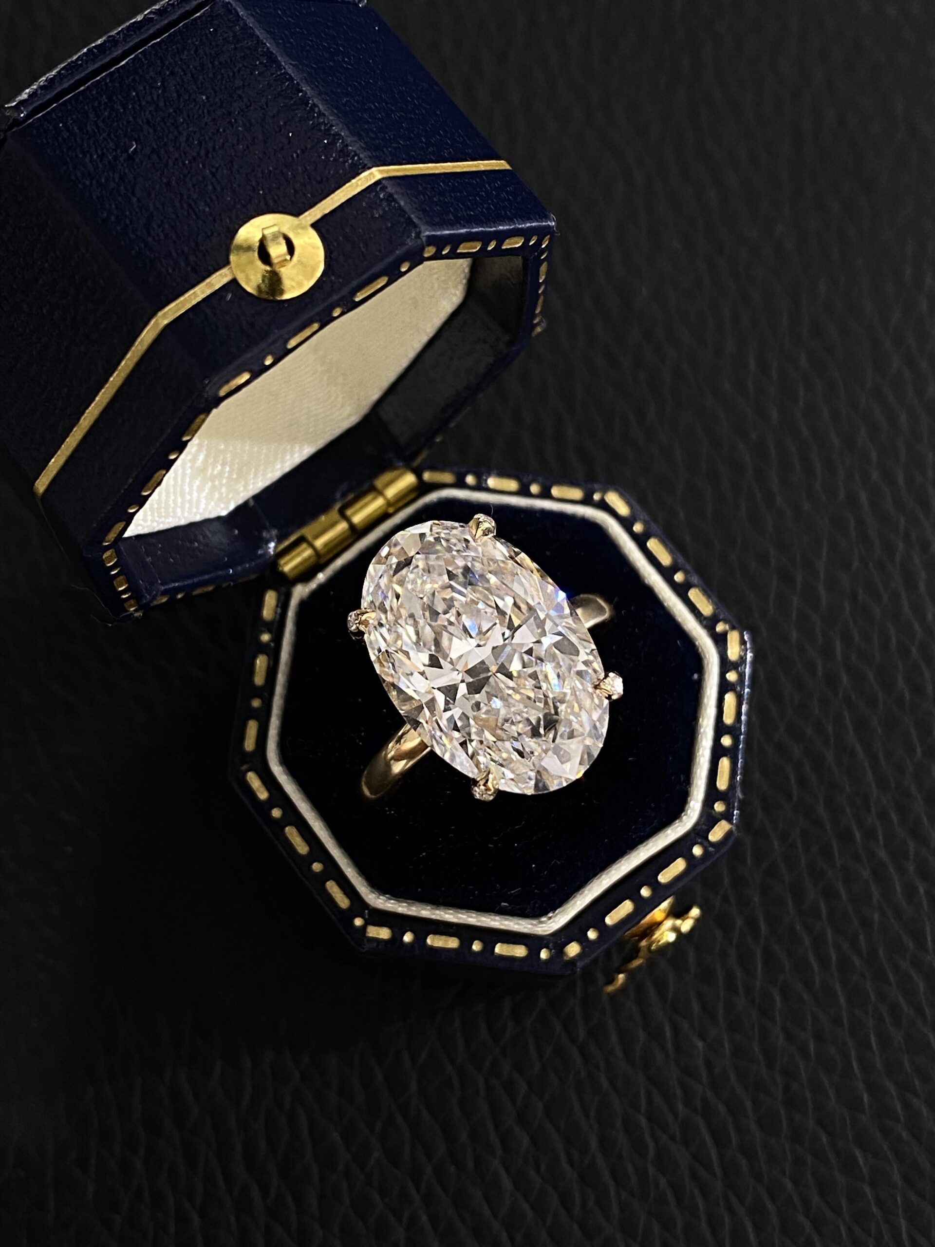 3846f80e87834ef049284b32d623ef58 7.7-Carat Lab-Grown Oval Diamond Ring: E Color, VVS2 Clarity in 18K Gold - Image 1