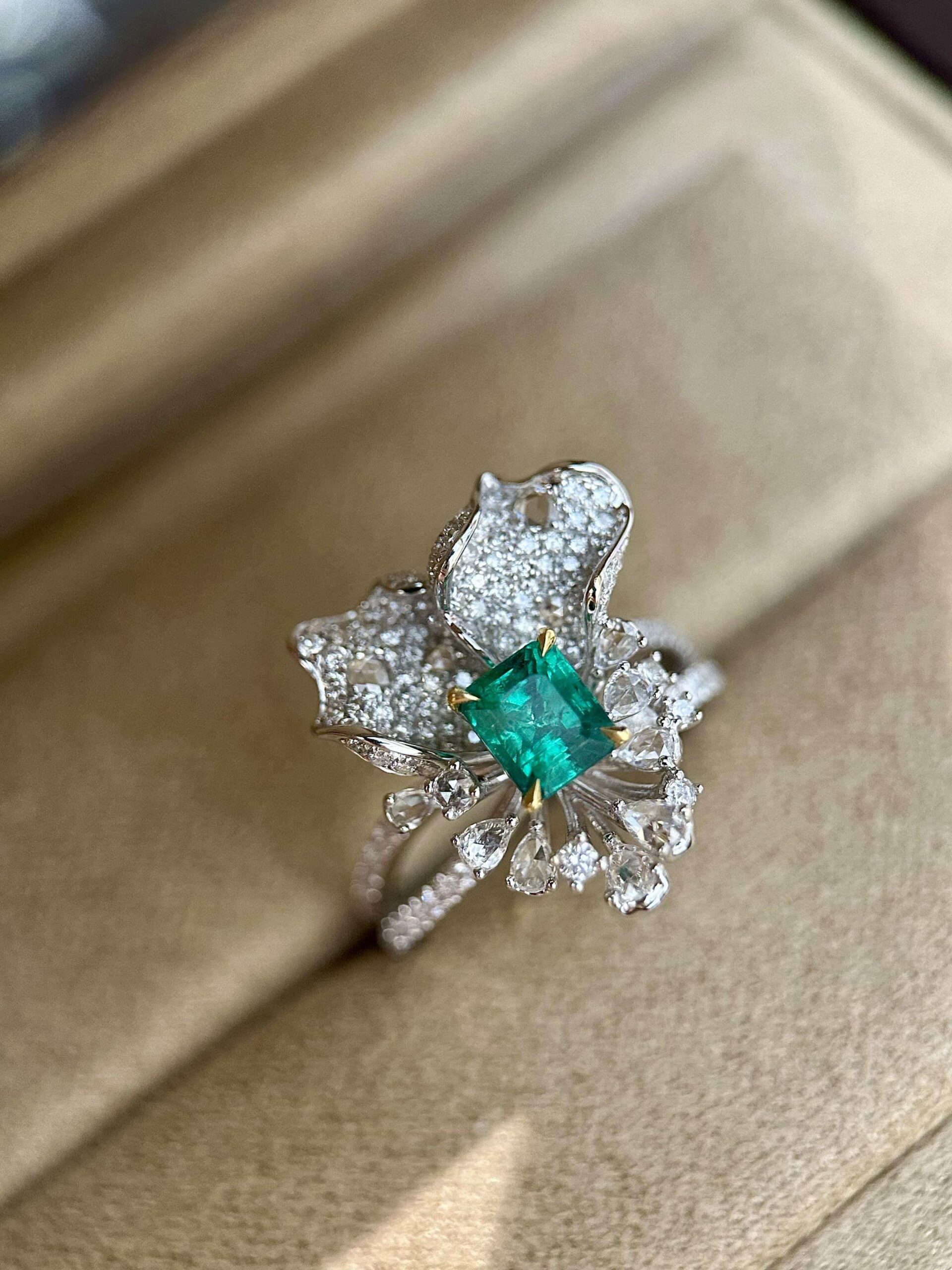 6487d5dfc096229e04d7bd4c00a86ae7 1.2ct Lab-Grown Emerald Floral Statement Ring - Image 1