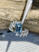 1.08-Carat Emerald-Cut Aquamarine Ring: VVS1 Clarity with Olive Branch Design in 14K White Gold