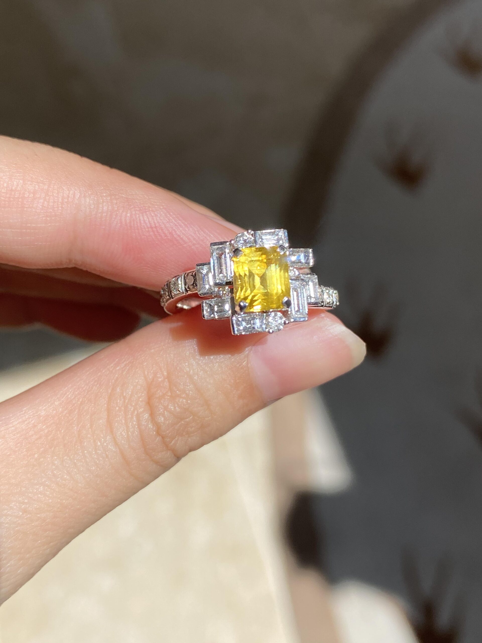 8b3ba3053f5509957e6caa07cf841da1 1.11-Carat Sri Lankan Asscher-Cut Yellow Sapphire Ring: Canary Yellow with 0.73-Carat Baguette Diamonds in 18K White Gold - Image 1
